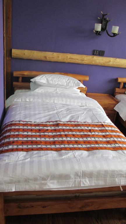 Nirvana Hotel, Restaurant & Bar Xiahe Chambre photo