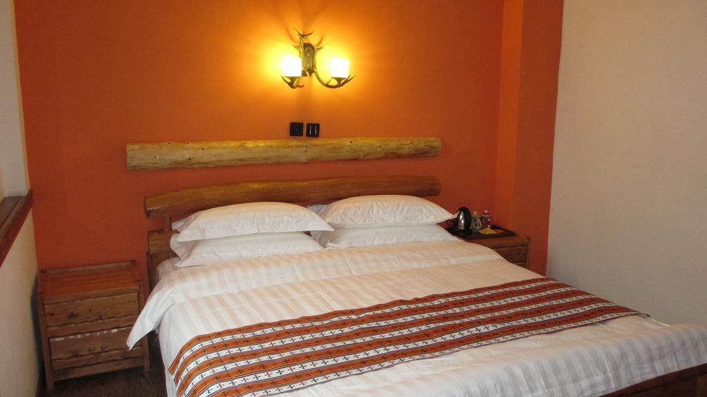 Nirvana Hotel, Restaurant & Bar Xiahe Chambre photo